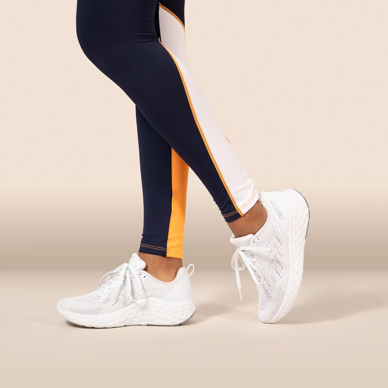 white sneaker on foot